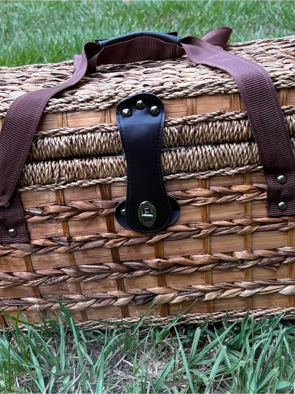 Woven Picnic Basket with Brown Straps and Leather Accents